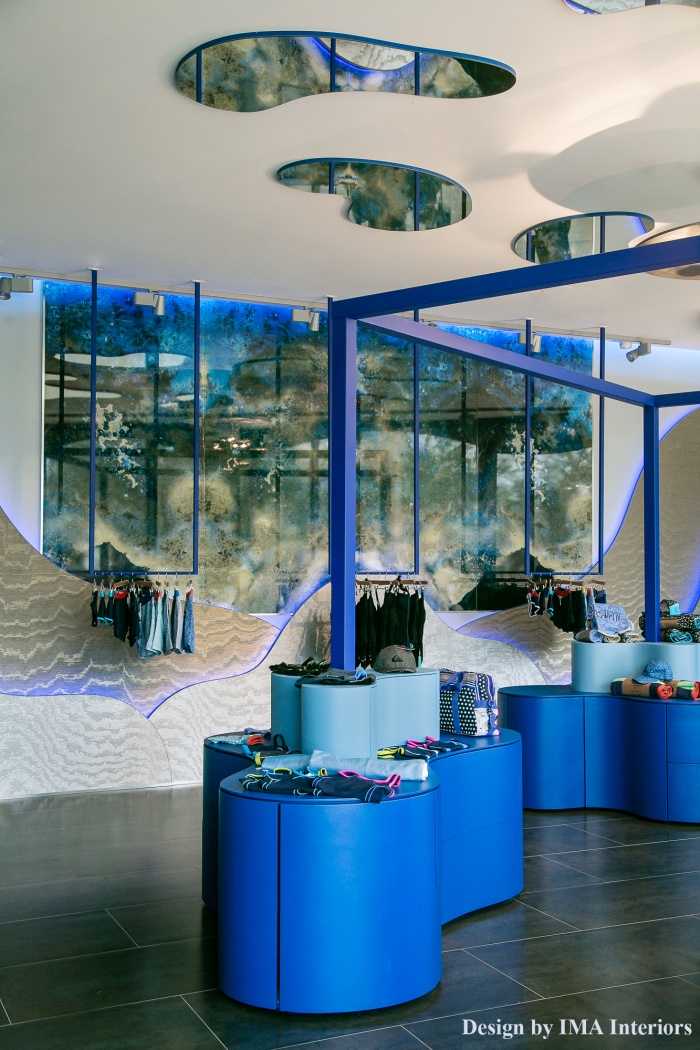 https://www.luxiona2020.mortensen.cat/projects/projects/retail/Boutique Swind Village Nature Disney/IMA Interiors 5.jpg